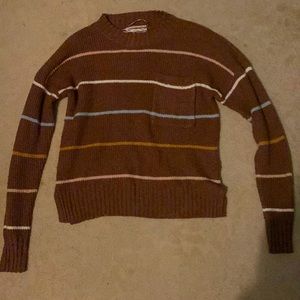 brown sweater with colourful stripes